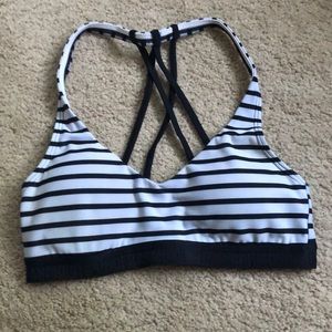 Black and white Under Armour sports bra